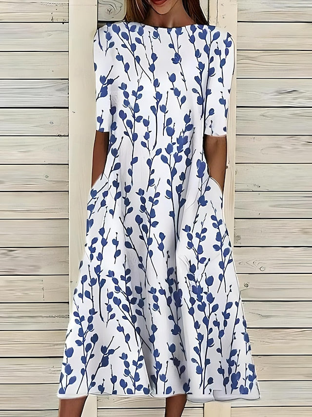 Sela™ – Stilvolles Midikleid im floralen Sommerlook