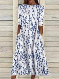 Sela™ – Stilvolles Midikleid im floralen Sommerlook