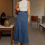 "Mía - Hochtaillierter Denim-Midirock" can be rewritten as "Mía - Hochtaillierter Denim-Midirock in Midi-Länge".
